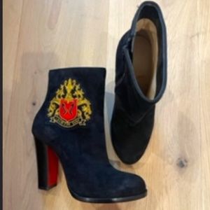 Christian Louboutin red bottom zip boots